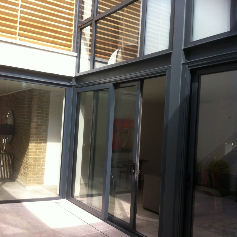 Anthracite aluminium sliding patio doors fitted in Brentford