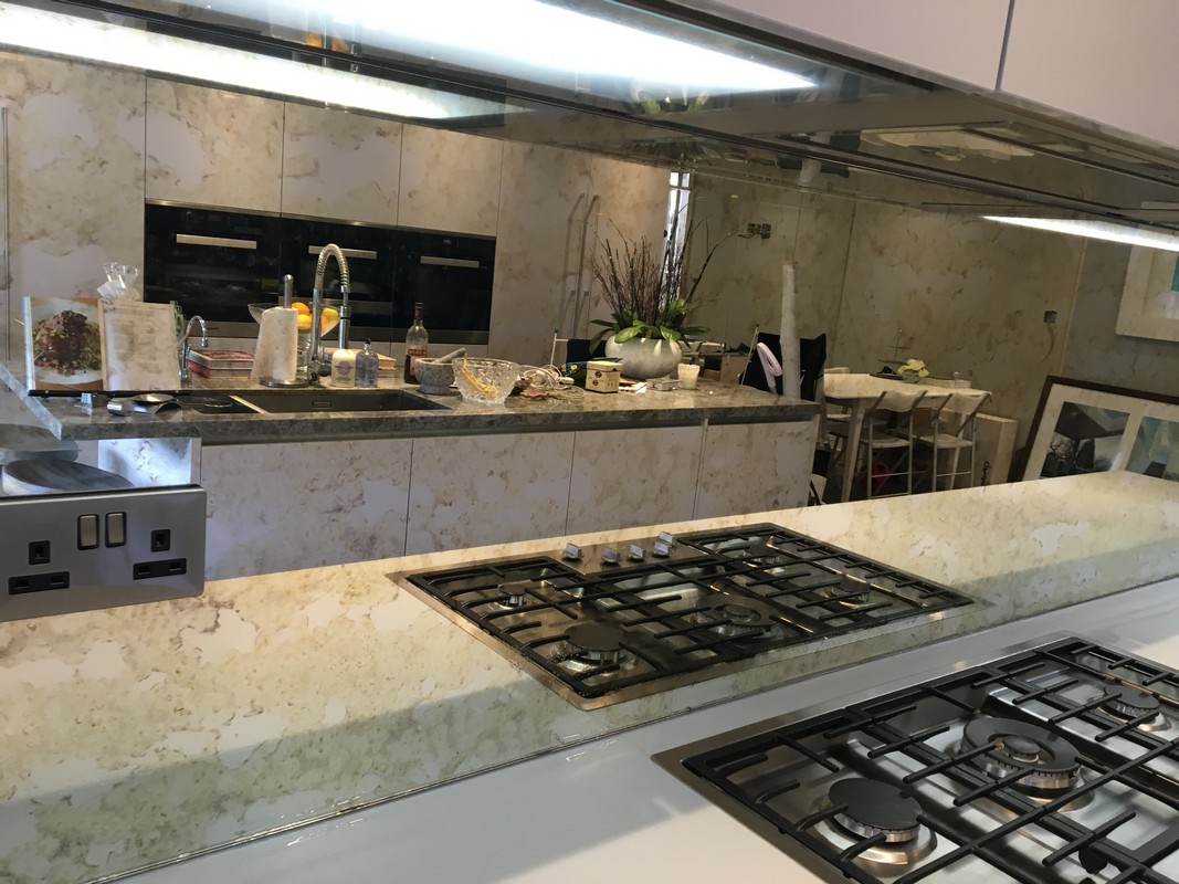 Mirror glass splashback in Brentford luxury kitchen